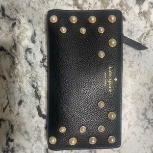 Kate spade wallet with pearls ! Had been used often